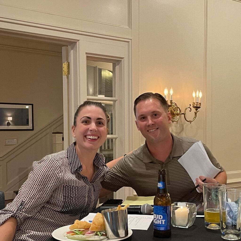 Couple celebrating together at a private dinner at Shuttle Meadow Country Club