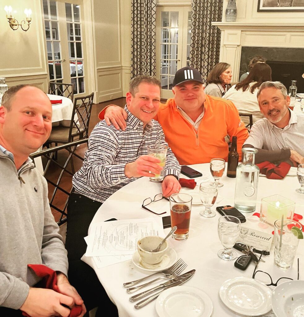 Guests at a business dinner in the Shuttle Meadow clubhouse