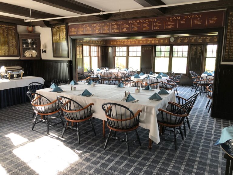 Grille Room at Shuttle Meadow Country Club set for a business luncheon