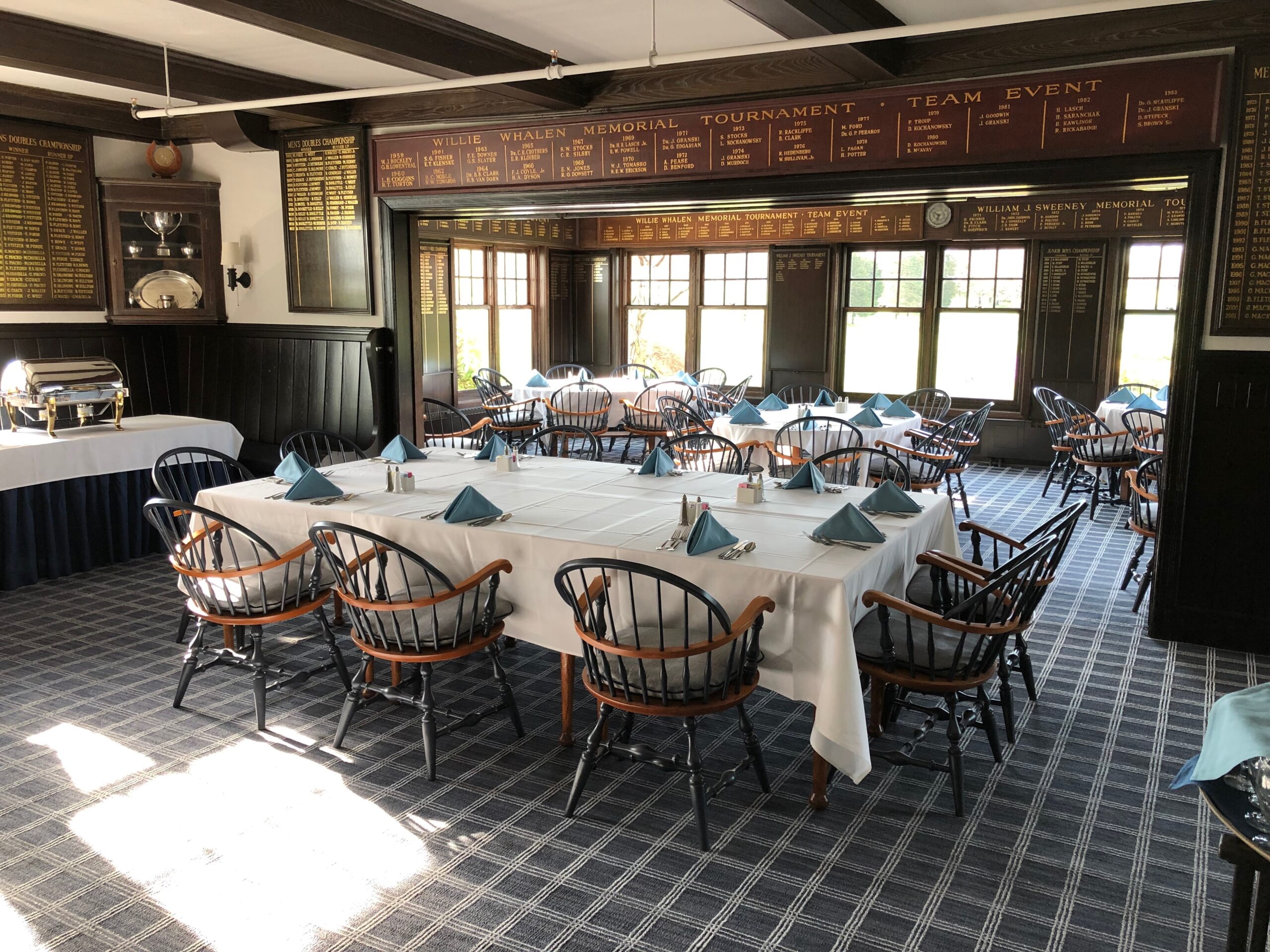 Grille Room at Shuttle Meadow Country Club set for a business luncheon